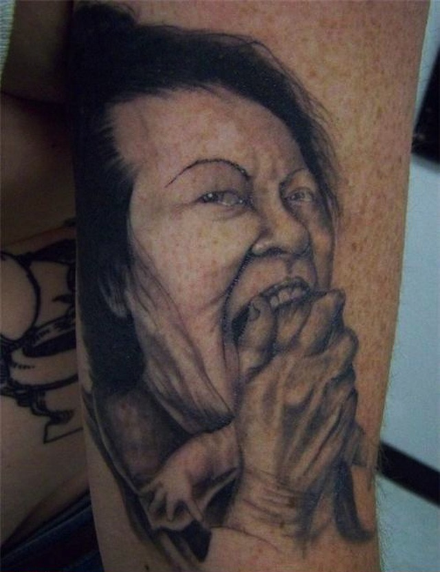Татуировка портрет неудачный